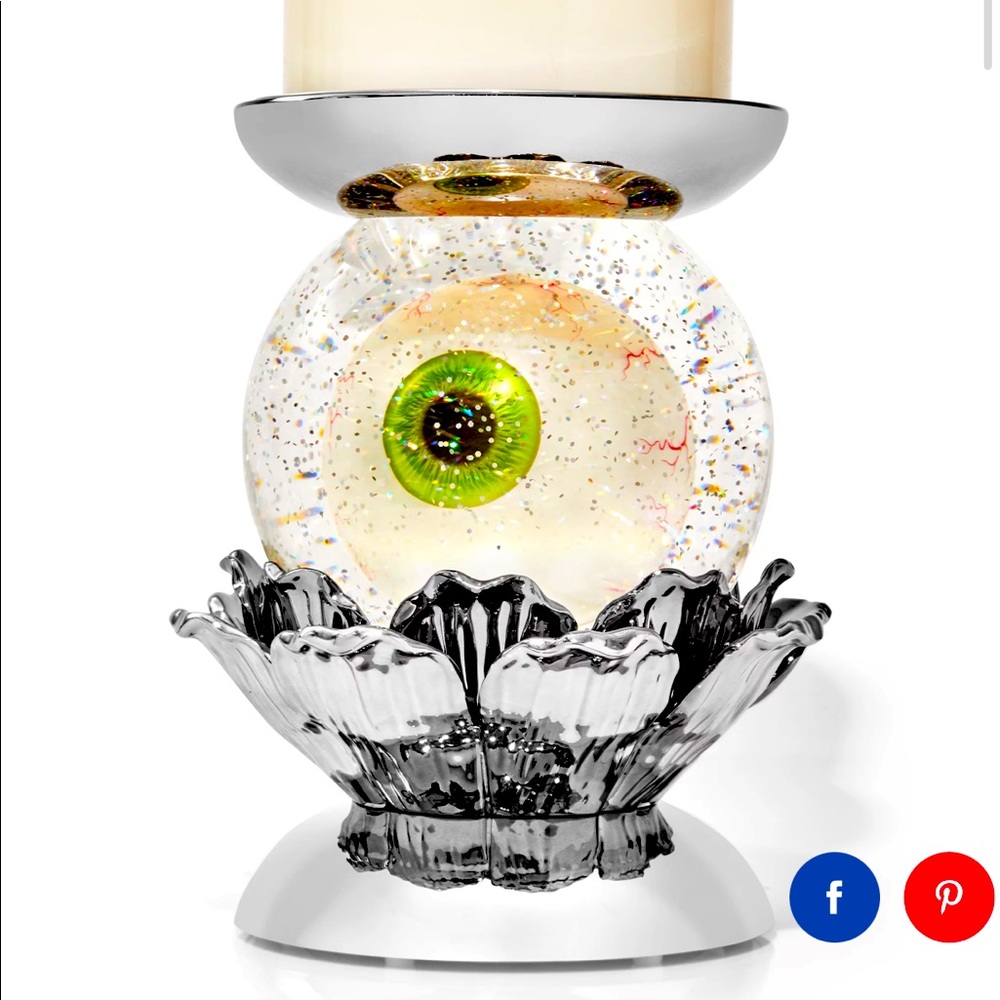 Bath and Body Works water globe eye pedestal.